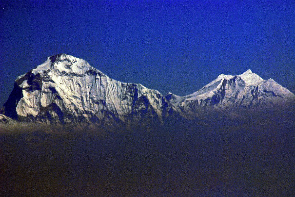 01 Flight To Kathmandu 04 Dhaulagiri and Tukuche Peak Close Up Dhaulagiri and Tukuche Peak close up from the early morning flight from Doha to Kathmandu.